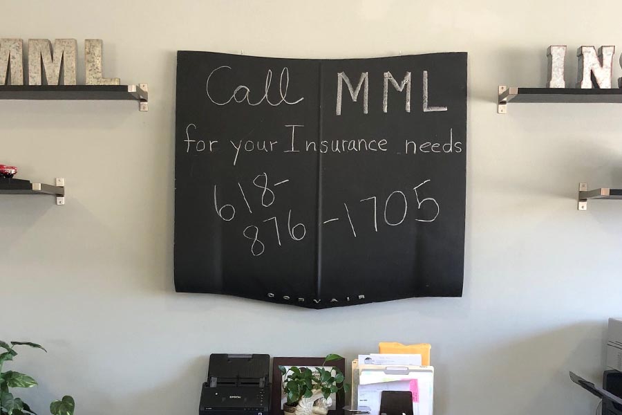 Contact - Chalkboard Sign at MML Insurance, Upon Which Is Written "Call MML for Your Insurance Needs - 618-876-1705"